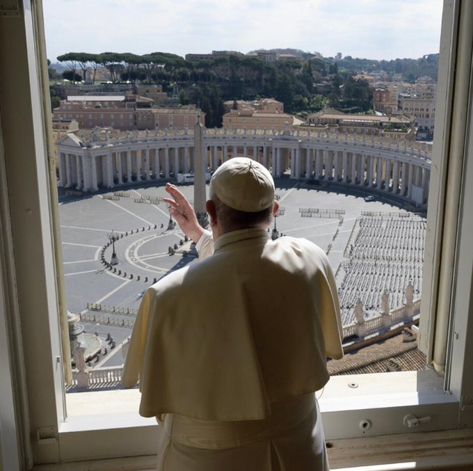 Pope Francis blesses an empty St. Peter's Square. Pope Francis blesses an empty St. Peter's Square.