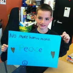 'No more hurting people. Peace,' reads the poster held by Martin Richard, the youngest life lost on Marathon Monday last year. 'No more hurting people. Peace,' reads the poster held by Martin Richard, the youngest life lost on Marathon Monday last year.