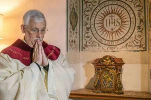 Father Arturo Sosa Abascal, superior general of the Society of Jesus, prepares to say Mass at the Church of the Gesu in Rome Oct. 15. Father Arturo Sosa Abascal, superior general of the Society of Jesus, prepares to say Mass at the Church of the Gesu in Rome Oct. 15.