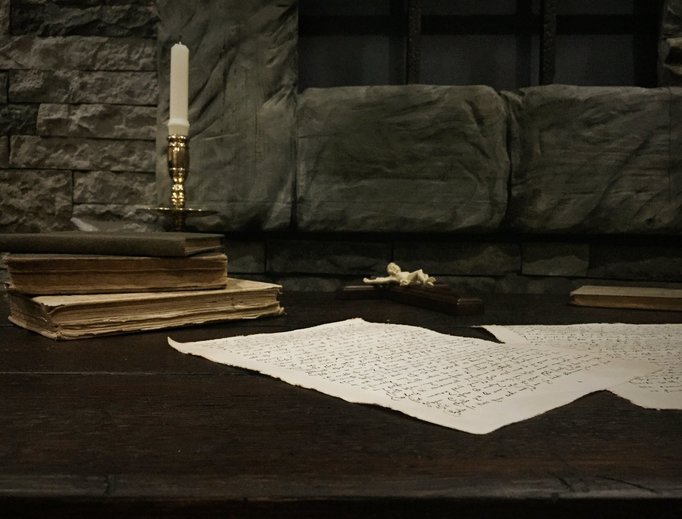 Above, a replica of Tower of London cell where the saint awaited his execution; below, portrait of St. Thomas More, as well as his felt hat and crucifix. The cell replica and relics are included in a new Washington exhibit. Above, a replica of Tower of London cell where the saint awaited his execution; below, portrait of St. Thomas More, as well as his felt hat and crucifix. The cell replica and relics are included in a new Washington exhibit.