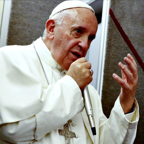 Pope Francis talks to journalists during a press conference he held while en route to Italy on Sept. 28.
Pope Francis talks to journalists during a press conference he held while en route to Italy on Sept. 28.