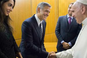 Pope Francis meets George and Amal Clooney at the Vatican May 29, 2016. Pope Francis meets George and Amal Clooney at the Vatican May 29, 2016.