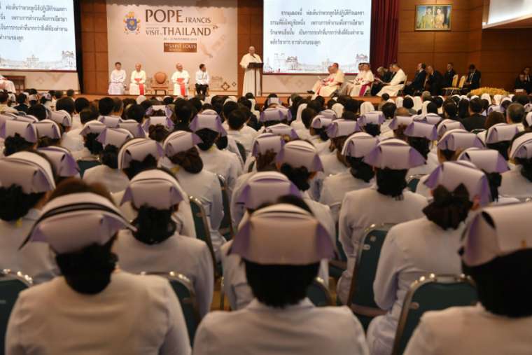 Pope Francis addresses medical personnel at St. Louis Catholic Hospital in Bangkok Nov. 21. Pope Francis addresses medical personnel at St. Louis Catholic Hospital in Bangkok Nov. 21.