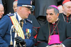 Domenico Giani and then-Archbishop Angelo Becciu attend the Gendarmes’ parade at the Vatican for the feast of St. Michael the Archangel on Oct. 5, 2012. Domenico Giani and then-Archbishop Angelo Becciu attend the Gendarmes’ parade at the Vatican for the feast of St. Michael the Archangel on Oct. 5, 2012.