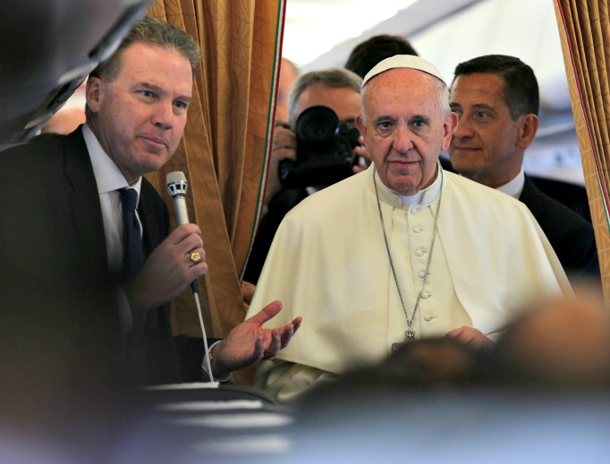 Pope Francis takes a question from the press Sept. 30 aboard the flight to Tbilisi, Georgia. Pope Francis takes a question from the press Sept. 30 aboard the flight to Tbilisi, Georgia.