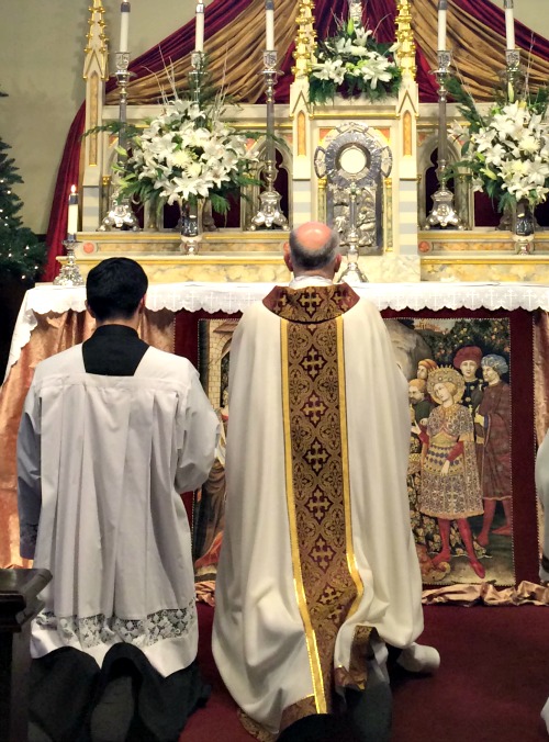 Archbishop Salvatore Cordileone and an altar boy kneel before the Blessed Sacrament at the Church of the Nativity in Menlo Park, Calif. Archbishop Salvatore Cordileone and an altar boy kneel before the Blessed Sacrament at the Church of the Nativity in Menlo Park, Calif.