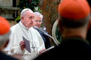 Pope Francis holds two books he presented as a gift to cardinals and bishops on the occasion of his Christmas greetings to the Roman Curia, Dec. 21, 2019, in the Clementine Hall at the Vatican. Pope Francis holds two books he presented as a gift to cardinals and bishops on the occasion of his Christmas greetings to the Roman Curia, Dec. 21, 2019, in the Clementine Hall at the Vatican.