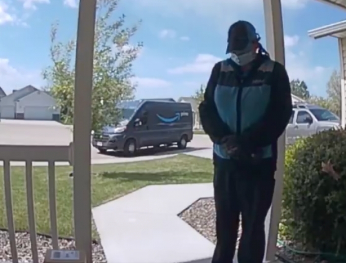 Monica Salinas stops to pray on delivery route. Monica Salinas stops to pray on delivery route.