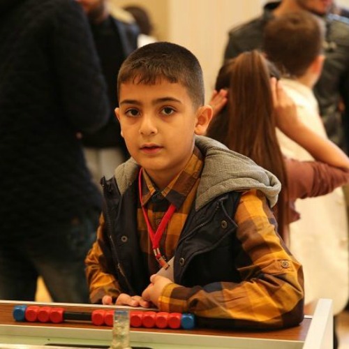 A boy waits with other young refugees, including many of from Syria and Iraq, for a Nov. 30 meeting with Pope Francis in Istanbul's Salesian Oratory. A boy waits with other young refugees, including many of from Syria and Iraq, for a Nov. 30 meeting with Pope Francis in Istanbul's Salesian Oratory.