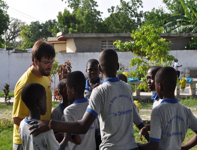 Seminarian Jimmy Morgan with young Haitians Seminarian Jimmy Morgan with young Haitians