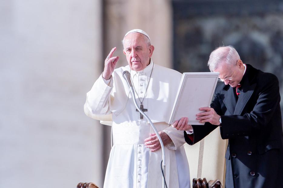 Pope Francis gives a blessing during his weekly general audience at the Vatican, Nov. 27, 2019. Pope Francis gives a blessing during his weekly general audience at the Vatican, Nov. 27, 2019.