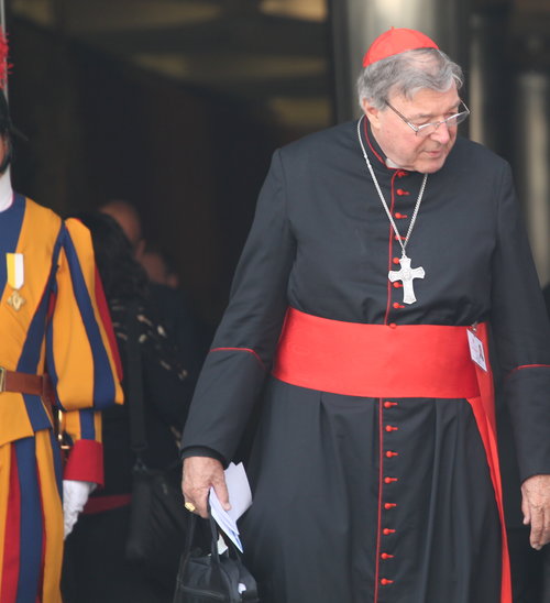 Cardinal George Pell leaves the Vatican's Synod Hall after a session of the synod on the family on Oct. 13, 2014. Cardinal George Pell leaves the Vatican's Synod Hall after a session of the synod on the family on Oct. 13, 2014.