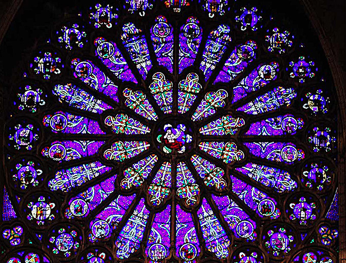 Rose window on south end of transept arm, St. Denis Cathedral, St. Denis, France. The stained glass depicts the Tree of Jesse (ancestors of Christ from Jesse onwards) in the Art Nouveau style. Rose window on south end of transept arm, St. Denis Cathedral, St. Denis, France. The stained glass depicts the Tree of Jesse (ancestors of Christ from Jesse onwards) in the Art Nouveau style.
