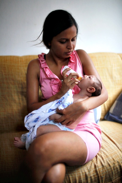 Mother Daniele Santos feeds her baby Juan Pedro, 2-months-old, who was born with microcephaly, on Feb. 3 in Recife, Brazil. In the last four months, authorities have recorded thousands of cases in Brazil in which the mosquito-borne Zika virus may have led to microcephaly in infants. Below, city workers fumigate a city block in an effort to eradicate the mosquitos that transmit the Zika virus on Feb. 2 in Recife. Mother Daniele Santos feeds her baby Juan Pedro, 2-months-old, who was born with microcephaly, on Feb. 3 in Recife, Brazil. In the last four months, authorities have recorded thousands of cases in Brazil in which the mosquito-borne Zika virus may have led to microcephaly in infants. Below, city workers fumigate a city block in an effort to eradicate the mosquitos that transmit the Zika virus on Feb. 2 in Recife.