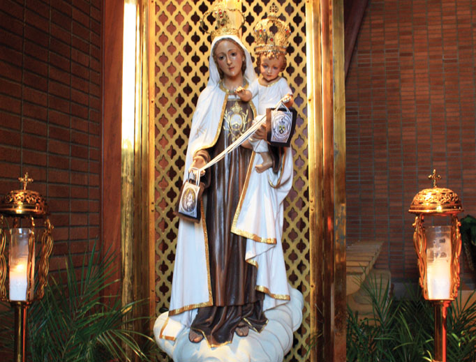 A statue of Our Lady of Mount Carmel from Portugal that dates to the 1940s is on display, along with other Marian imagery. A statue of Our Lady of Mount Carmel from Portugal that dates to the 1940s is on display, along with other Marian imagery.
