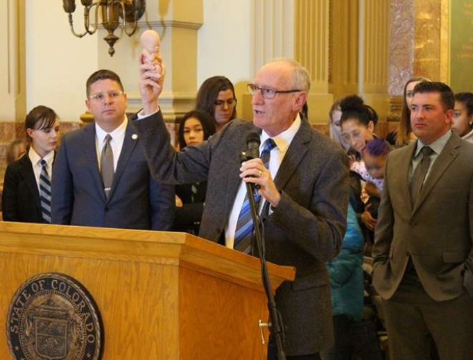Dr. Tom Perille, President of Colorado's chapter of Democrats for Life displays a model of a seven month old unborn baby at the Colorado State Capitol on February 11, 2020. Dr. Tom Perille, President of Colorado's chapter of Democrats for Life displays a model of a seven month old unborn baby at the Colorado State Capitol on February 11, 2020.