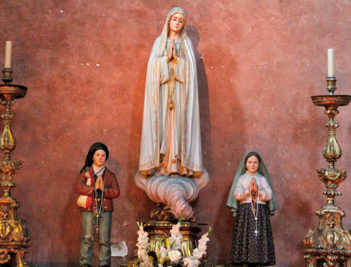 Shrine to Our Lady of Fatima, flanked by Francisco and Jacinta Marto, Church of St. Dominic, Lisbon. Shrine to Our Lady of Fatima, flanked by Francisco and Jacinta Marto, Church of St. Dominic, Lisbon.