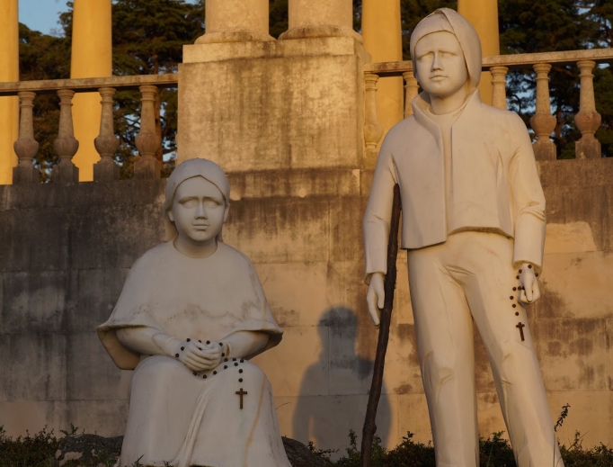 Statues in Fatima of soon-to-be saints Francisco and Jacinta Marto remind the faithful that Mary appeared as Our Lady of the Rosary. Statues in Fatima of soon-to-be saints Francisco and Jacinta Marto remind the faithful that Mary appeared as Our Lady of the Rosary.