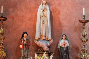Shrine to Our Lady of Fatima, flanked by Francisco and Jacinta Marto, Church of St. Dominic, Lisbon. Shrine to Our Lady of Fatima, flanked by Francisco and Jacinta Marto, Church of St. Dominic, Lisbon.