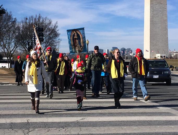 ABOVE: A group of marchers from St. Stephen of Hungary Parish in Allentown, Pennsylvania, on Jan. 19, 2018, near the Washington Monument. Photo by Maryann Schwartz. BELOW: (1) Angelo Evans from Greensboro, North Carolina. (2) Nicholas Hiles from Gaithersburg, Maryland. Photos by Susie Lloyd. ABOVE: A group of marchers from St. Stephen of Hungary Parish in Allentown, Pennsylvania, on Jan. 19, 2018, near the Washington Monument. Photo by Maryann Schwartz. BELOW: (1) Angelo Evans from Greensboro, North Carolina. (2) Nicholas Hiles from Gaithersburg, Maryland. Photos by Susie Lloyd.