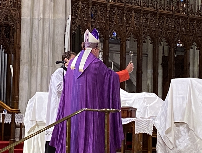 Cardinal Dolan blesses the remains of immigrants who died of coronavirus inside St. Patrick's Cathedral in Manhattan on July 11, 2020. Cardinal Dolan blesses the remains of immigrants who died of coronavirus inside St. Patrick's Cathedral in Manhattan on July 11, 2020.