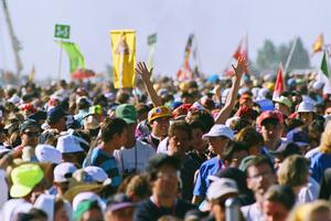 An estimated 750,000 youth descended on Cherry Creek State Park in August 1993, as shown in archival photos that include Pope St. John Paul II celebrating the closing Mass. The 25th anniversary was celebrated Aug. 11 in Denver (below). Archbishop Samuel Aquila is showing celebrating the anniversary Mass with priests from the Archdiocese of Denver. An estimated 750,000 youth descended on Cherry Creek State Park in August 1993, as shown in archival photos that include Pope St. John Paul II celebrating the closing Mass. The 25th anniversary was celebrated Aug. 11 in Denver (below). Archbishop Samuel Aquila is showing celebrating the anniversary Mass with priests from the Archdiocese of Denver.