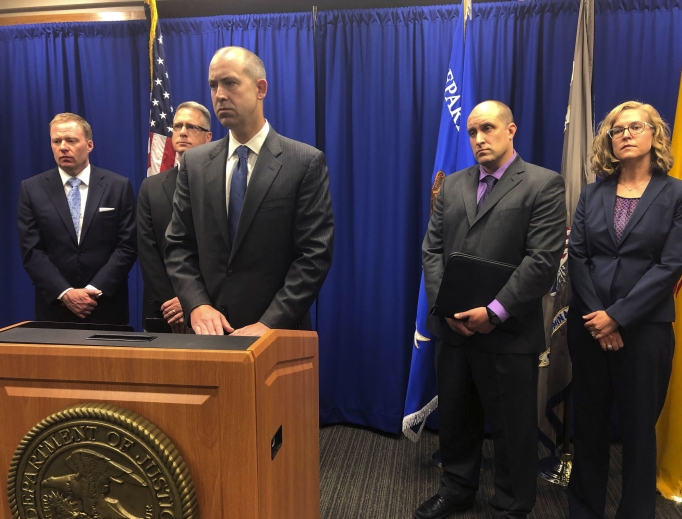 U.S. Attorney John Anderson, center at podium, speaks at a news conference Sept. 21 in Albuquerque, New Mexico, about the investigation into a fugitive Catholic priest who is accused of sex abuse. Federal authorities said FBI agents returned 80-year-old Arthur Perrault to New Mexico to face child sexual-abuse charges after a year in the custody of Moroccan authorities. New Mexico is among the states that have already begun probes into diocesan responses to allegations of sexual misconduct. U.S. Attorney John Anderson, center at podium, speaks at a news conference Sept. 21 in Albuquerque, New Mexico, about the investigation into a fugitive Catholic priest who is accused of sex abuse. Federal authorities said FBI agents returned 80-year-old Arthur Perrault to New Mexico to face child sexual-abuse charges after a year in the custody of Moroccan authorities. New Mexico is among the states that have already begun probes into diocesan responses to allegations of sexual misconduct.