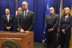 U.S. Attorney John Anderson, center at podium, speaks at a news conference Sept. 21 in Albuquerque, New Mexico, about the investigation into a fugitive Catholic priest who is accused of sex abuse. Federal authorities said FBI agents returned 80-year-old Arthur Perrault to New Mexico to face child sexual-abuse charges after a year in the custody of Moroccan authorities. New Mexico is among the states that have already begun probes into diocesan responses to allegations of sexual misconduct. U.S. Attorney John Anderson, center at podium, speaks at a news conference Sept. 21 in Albuquerque, New Mexico, about the investigation into a fugitive Catholic priest who is accused of sex abuse. Federal authorities said FBI agents returned 80-year-old Arthur Perrault to New Mexico to face child sexual-abuse charges after a year in the custody of Moroccan authorities. New Mexico is among the states that have already begun probes into diocesan responses to allegations of sexual misconduct.