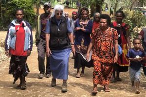 Sr. Lorena Jenal walks with local people from the Diocese of Mendi in Papua New Guinea. Sr. Lorena Jenal walks with local people from the Diocese of Mendi in Papua New Guinea.