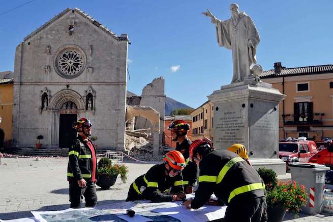 Norcia's statue of St. Benedict in front of the town's basilica that was flattened in an earthquake on Oct. 30, leaving just its facade standing. Norcia's statue of St. Benedict in front of the town's basilica that was flattened in an earthquake on Oct. 30, leaving just its facade standing.
