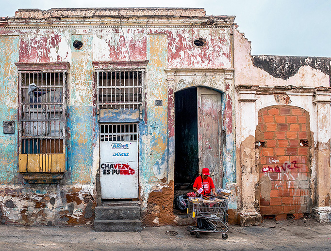 Graffiti praising socialist dictator Hugo Chávez is seen on a house in Maracaibo, Venezuela. The International Monetary Fund projects that Venezuela’s inflation rate will hit 1,000,000 percent in 2018. Graffiti praising socialist dictator Hugo Chávez is seen on a house in Maracaibo, Venezuela. The International Monetary Fund projects that Venezuela’s inflation rate will hit 1,000,000 percent in 2018.