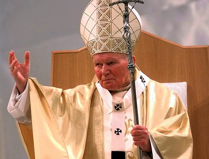 Pope St. John Paul II, who in 1982 founded the theological institute that is now named for him, gestures to the crowd during Mass in St. Louis, Missouri, Jan. 27, 1999.
Pope St. John Paul II, who in 1982 founded the theological institute that is now named for him, gestures to the crowd during Mass in St. Louis, Missouri, Jan. 27, 1999.