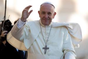Pope Francis waves to pilgrims during his Oct. 25 general audience in St. Peter’s Square. Pope Francis waves to pilgrims during his Oct. 25 general audience in St. Peter’s Square.