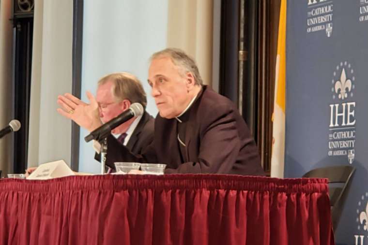 Cardinal Daniel DiNadro and Catholic University president John Garvey participate at the CUA conference Feb. 6. Cardinal Daniel DiNadro and Catholic University president John Garvey participate at the CUA conference Feb. 6.