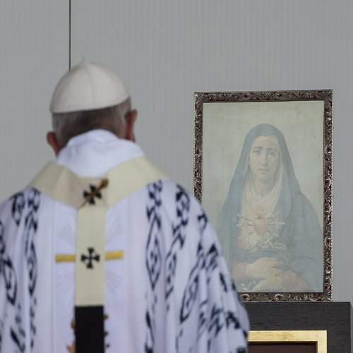 Pope Francis venerates an image of Mary with a Pierced Heart after celebrating Mass at the Bicentennial Park in Quito, Ecuador, on July 7, 2015.
Pope Francis venerates an image of Mary with a Pierced Heart after celebrating Mass at the Bicentennial Park in Quito, Ecuador, on July 7, 2015.