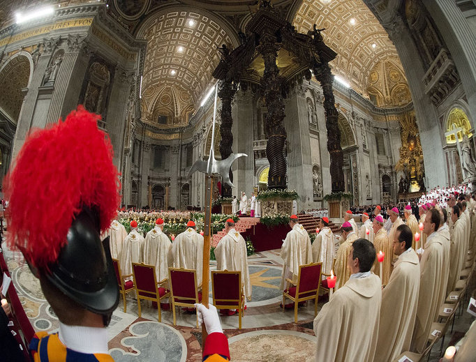 Swiss guards with cardinals and priests during the celebration of the Mass at the Easter vigil in St. Peter's Basilica on April 4, 2015.
Swiss guards with cardinals and priests during the celebration of the Mass at the Easter vigil in St. Peter's Basilica on April 4, 2015.
