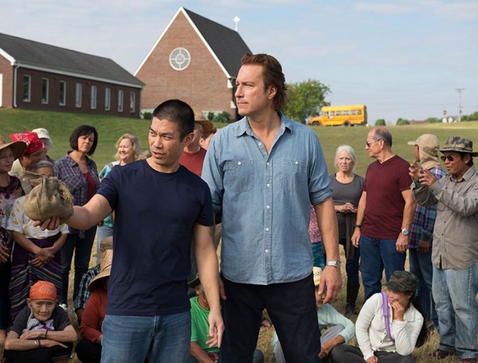 Ye Win (Nelson Lee) and Rev. Michael Spurlock (John Corbett) work together for the good of community and faith. Ye Win (Nelson Lee) and Rev. Michael Spurlock (John Corbett) work together for the good of community and faith.