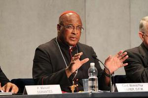 Cardinal Wilfrid Napier speaks at the Vatican Press Office. Cardinal Wilfrid Napier speaks at the Vatican Press Office.