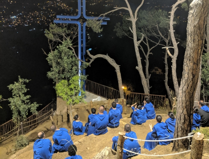 Brothers and sisters from the religious order Mission of Life pray at the cross, the final station of the Way of Life hiking path at the order's Village of Peace in Mashraa, Lebanon, which is on a hillside. Below: A sculpture of Jesus in the Garden of Gethsemane in the Way of Life hiking path was created by sculptor Nayef Alwan. Also shown: Lebanese Cardinal Bechara Rai, patriarch of Maronite Catholics (left), hikes the Way of Life path with Father Wissam Maalouf, founder of the Mission of Life religious order, as youth involved in Youth of Life participate in a July camp. Brothers and sisters from the religious order Mission of Life pray at the cross, the final station of the Way of Life hiking path at the order's Village of Peace in Mashraa, Lebanon, which is on a hillside. Below: A sculpture of Jesus in the Garden of Gethsemane in the Way of Life hiking path was created by sculptor Nayef Alwan. Also shown: Lebanese Cardinal Bechara Rai, patriarch of Maronite Catholics (left), hikes the Way of Life path with Father Wissam Maalouf, founder of the Mission of Life religious order, as youth involved in Youth of Life participate in a July camp.