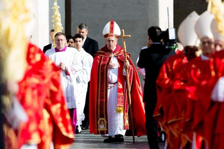 Pope Francis celebrates Palm Sunday Mass in St. Peter's Square March 25. Pope Francis celebrates Palm Sunday Mass in St. Peter's Square March 25.