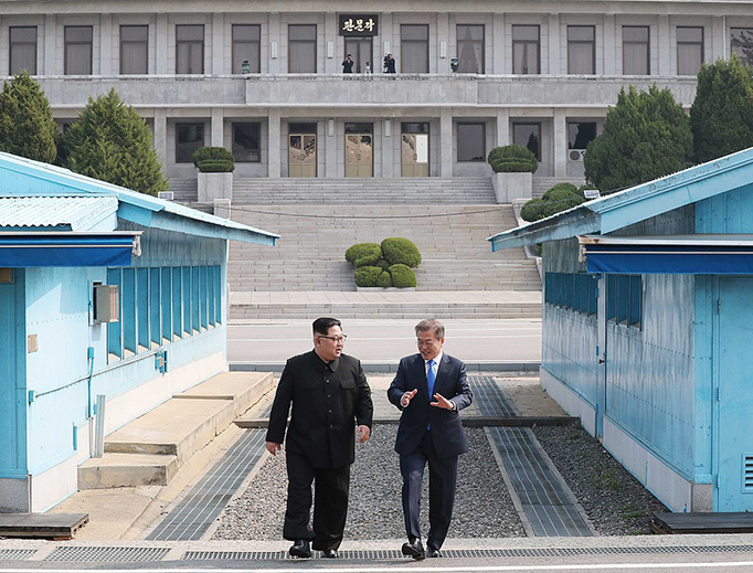 Kim Jong-un walks with President Moon Jae-in in the Joint Security Area between North and South Korea on April 27, 2018 Kim Jong-un walks with President Moon Jae-in in the Joint Security Area between North and South Korea on April 27, 2018