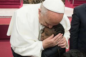 Pope Francis hosts a pizza party for sick children in Vatican City on Dec. 17, 2017. Pope Francis hosts a pizza party for sick children in Vatican City on Dec. 17, 2017.