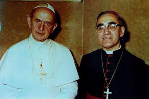 Pope Paul VI and Archbishop Oscar Romero pose together in an undated file photo. Pope Paul VI and Archbishop Oscar Romero pose together in an undated file photo.