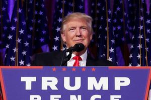 Republican president-elect Donald Trump gives a thumbs up to the crowd during his acceptance speech at his election night event at the New York Hilton Midtown in the early morning hours of Nov. 9 in New York City. 