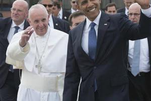Pope Francis is greeted by President Barack Obama upon his arrival on Sept. 22 at Andrews Air Force Base in Washington. Pope Francis is greeted by President Barack Obama upon his arrival on Sept. 22 at Andrews Air Force Base in Washington.