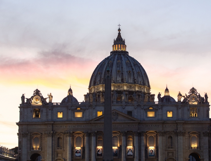 Banners with the official images of (l to r) Sister Irmã Dulce Pontes, Mother Giuseppina Vannini, John Henry Newman, who established seven tests to examine whether a development in doctrine is authentic development or whether it is a corruption, Mother Mariam Thresia and Marguerite Bays hang on the facade of St. Peter's Basilica on the evening of Oct. 12, the day before their canonizations.
Banners with the official images of (l to r) Sister Irmã Dulce Pontes, Mother Giuseppina Vannini, John Henry Newman, who established seven tests to examine whether a development in doctrine is authentic development or whether it is a corruption, Mother Mariam Thresia and Marguerite Bays hang on the facade of St. Peter's Basilica on the evening of Oct. 12, the day before their canonizations.