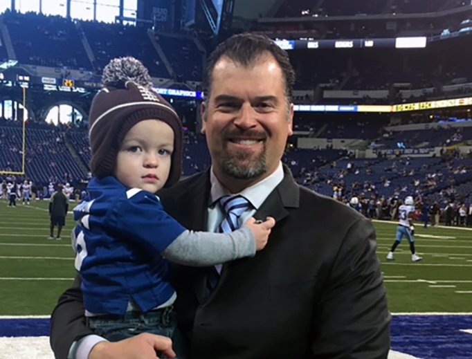 Ryan Grigson, when in Indianapolis, holds his youngest of his six children, Jonah. Ryan Grigson, when in Indianapolis, holds his youngest of his six children, Jonah.