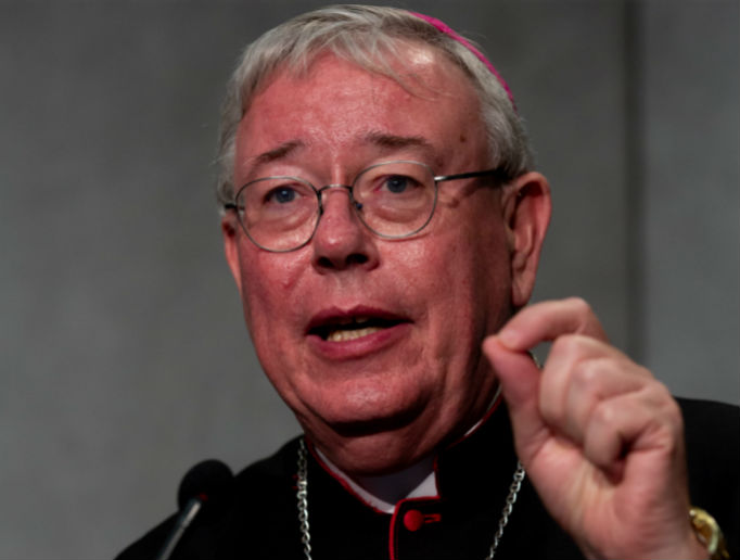 Archbishop Jean-Claude Hollerich of Luxembourg makes a point at a news conference at the Vatican Press Office on Oct. 10, 2018. Archbishop Jean-Claude Hollerich of Luxembourg makes a point at a news conference at the Vatican Press Office on Oct. 10, 2018.