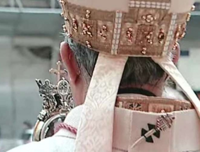The Archbishop of Naples blesses the city with St. Januarius' liquefied blood. The Archbishop of Naples blesses the city with St. Januarius' liquefied blood.