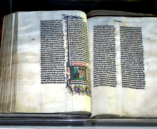 A Bible handwritten in Latin, on display in Malmesbury Abbey, Wiltshire, England. The Bible was written in Belgium in 1407, for reading aloud in a monastery.
A Bible handwritten in Latin, on display in Malmesbury Abbey, Wiltshire, England. The Bible was written in Belgium in 1407, for reading aloud in a monastery.